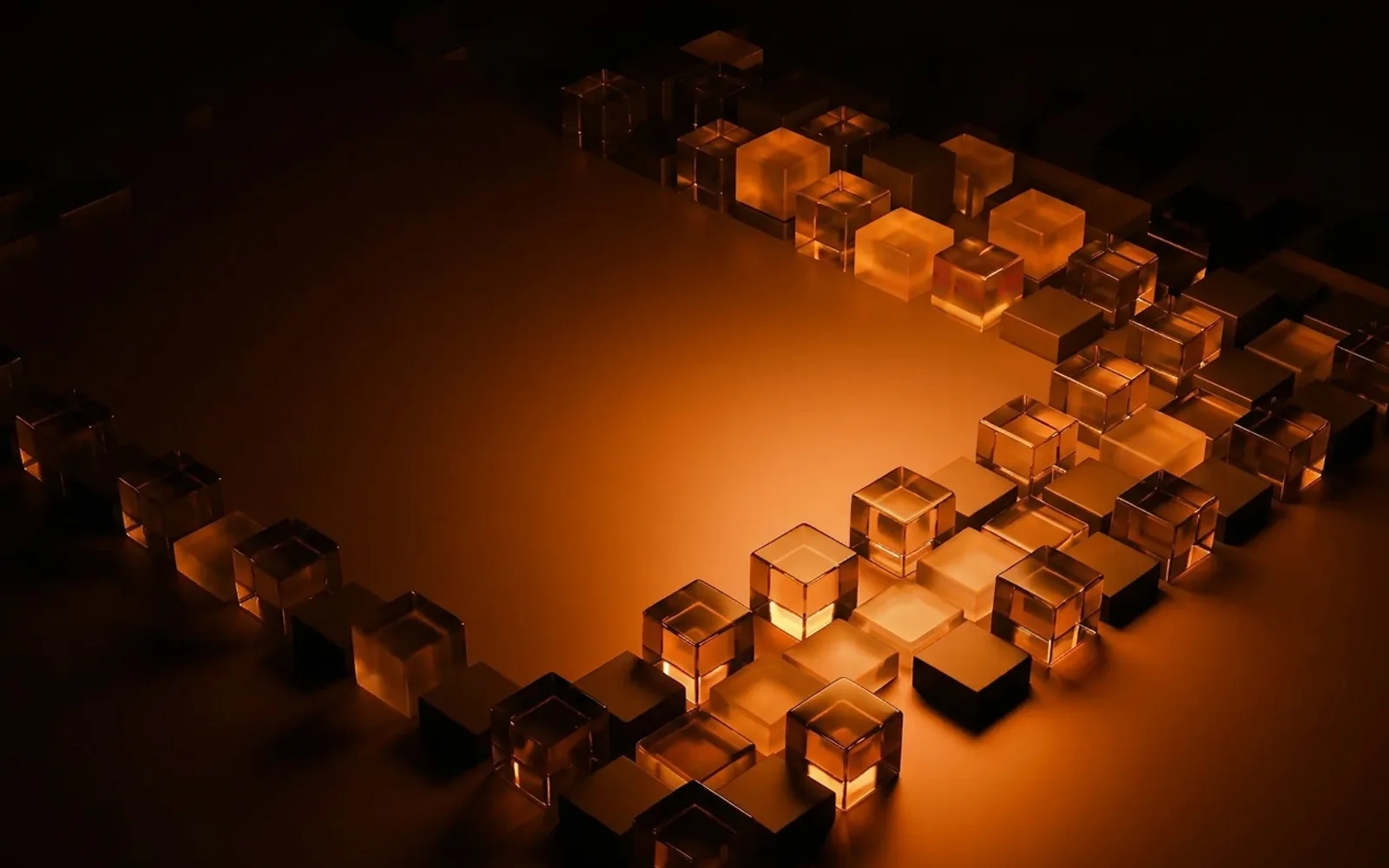 Copertina: cubi di vetro, luce ambra su fondo nero