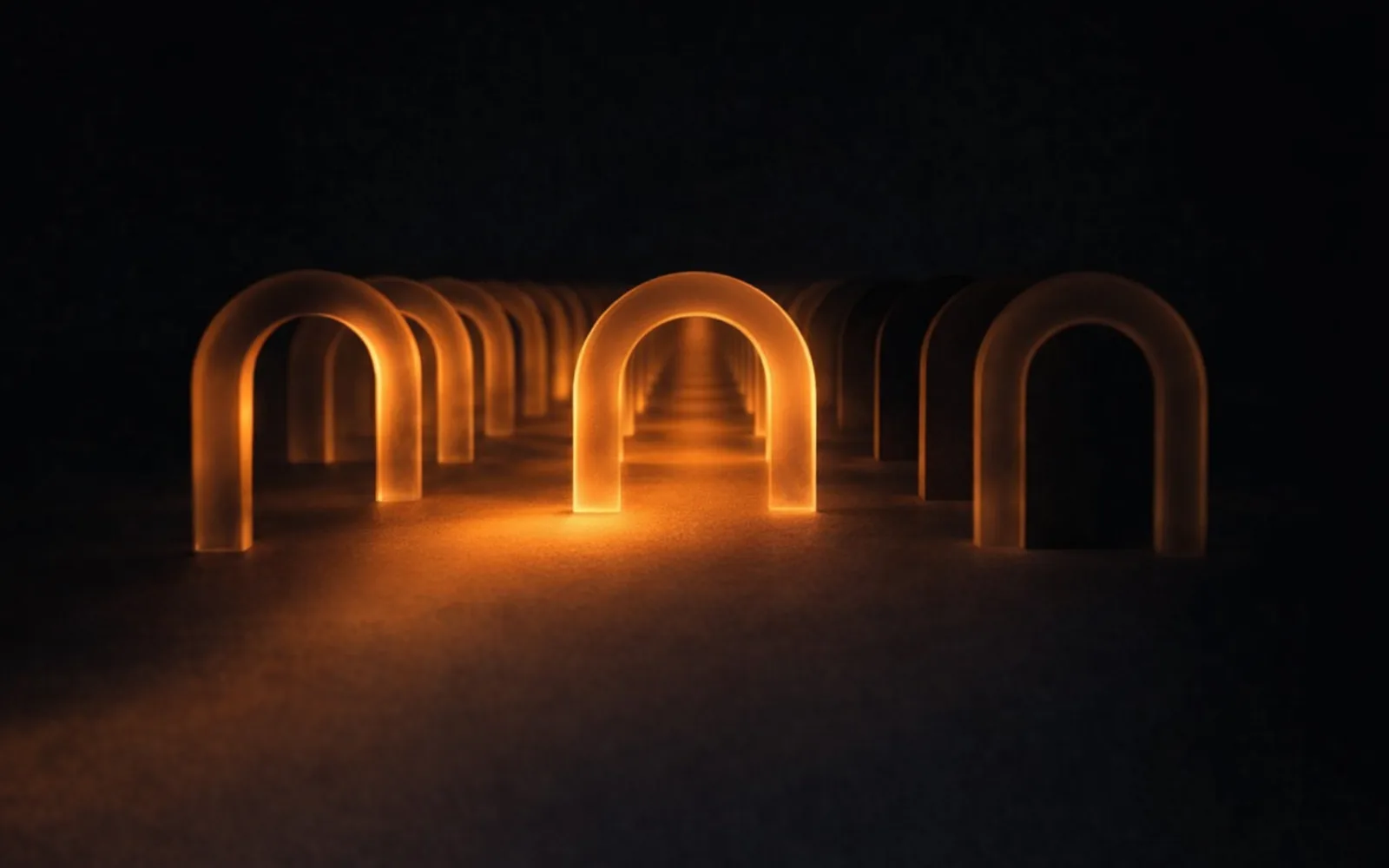 Copertina: archi di vetro, luce ambra su fondo nero